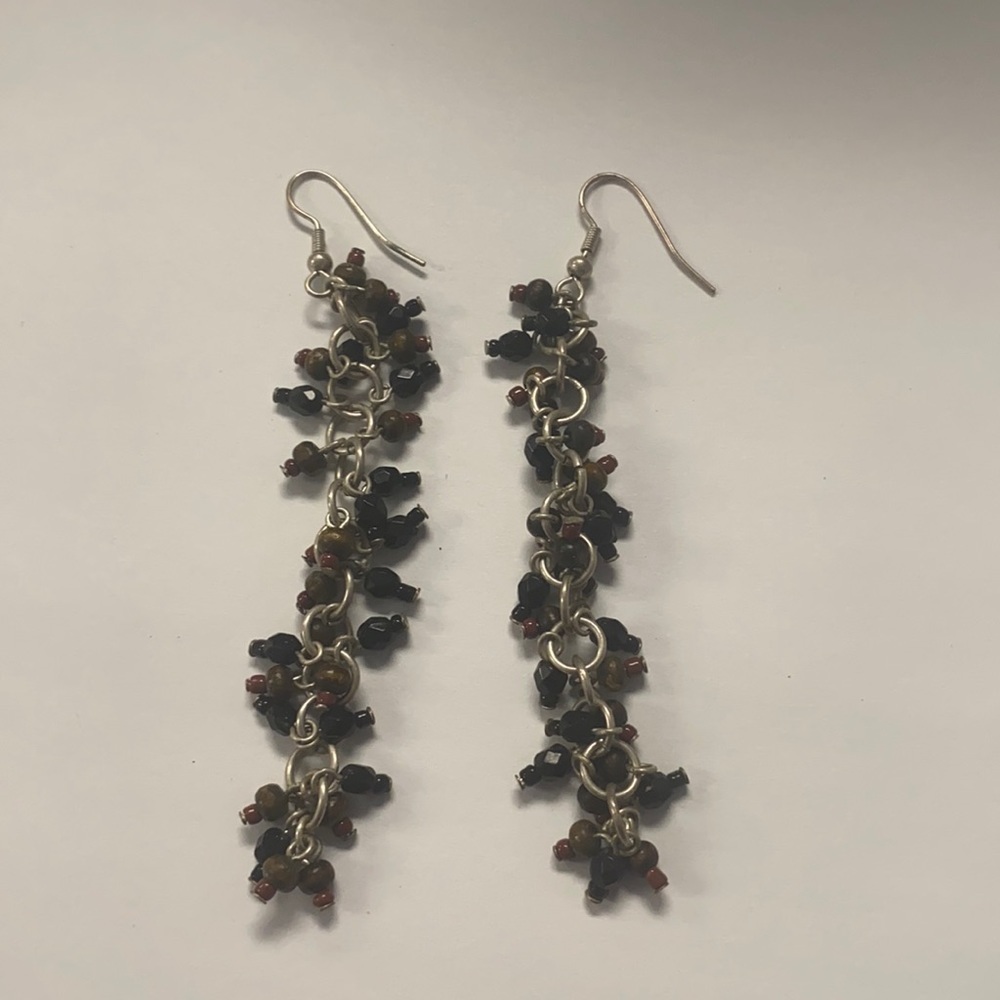 Black and brown long earrings